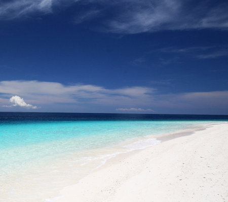 Beautiful beach at Maldives with turquoise water and white sandの写真素材