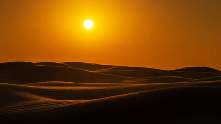Sunset over the sand dunes in the Sahara Desert, Moroccoの写真素材
