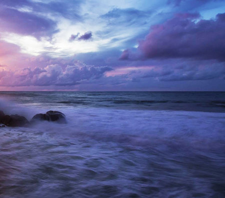 Beautiful sunset over the sea. Dramatic sky, seascape.の写真素材