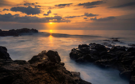 Beautiful Sunset at the beach in Phuket, Thailand.の写真素材