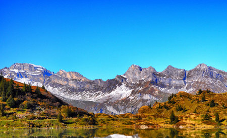 Autumn in the swiss alps (Braies lake)の写真素材