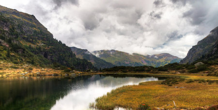 Panoramic view of a mountain lake in the Pyreneesの写真素材