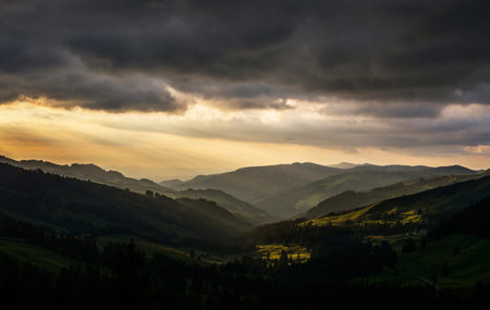 Majestic sunset in the mountains landscape. Dramatic sky. Carpathian, Ukraine, Europe. Beauty world.の写真素材