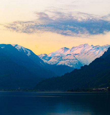 Sunset over Lake Lucerne with the Alps in the backgroundの写真素材