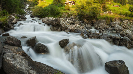 Mountain stream in the Swiss Alps, Switzerland. Long exposure.の写真素材