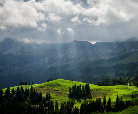 Mountain landscape with clouds and sunbeams. Dolomites, Italyの写真素材