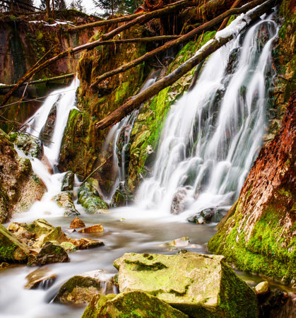 Waterfall in the forest. Long exposure. Beautiful nature scene.