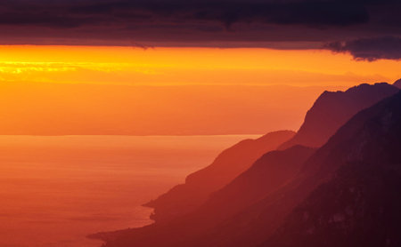 Sunset over the sea from the top of the mountain in Montenegroの写真素材