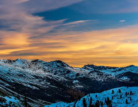 Sunset in the italian alps. Beautiful winter landscape.の写真素材