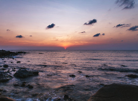 Beautiful sunset over the sea. The sun sets over the sea.の写真素材
