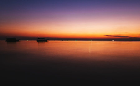 Sunset at the beach in Phuket, Thailand. Long exposure.の写真素材