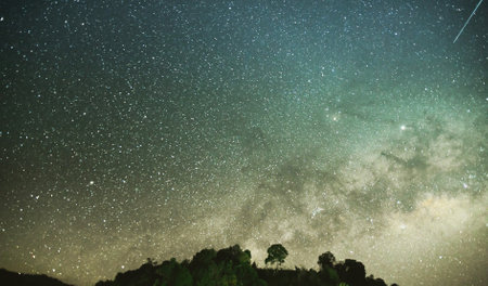 Milky way galaxy with stars and space dust in the universe. Long exposure photograph.with grain