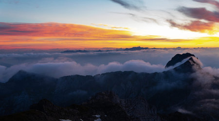 Sunset over the clouds in the Dolomites, Italy.の写真素材
