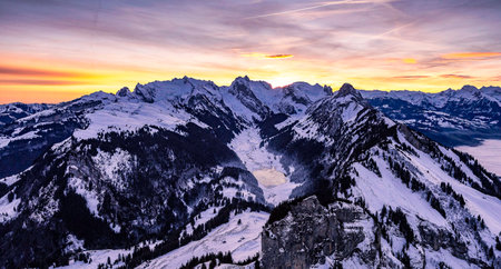 Panoramic view of the Swiss Alps at sunset, Switzerland.の写真素材