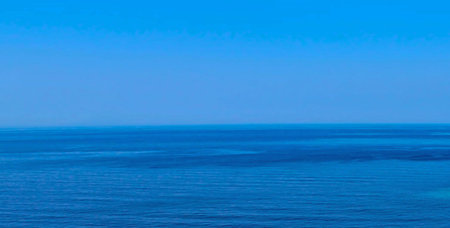 Blue sea and blue sky background. Top view of the sea.の写真素材