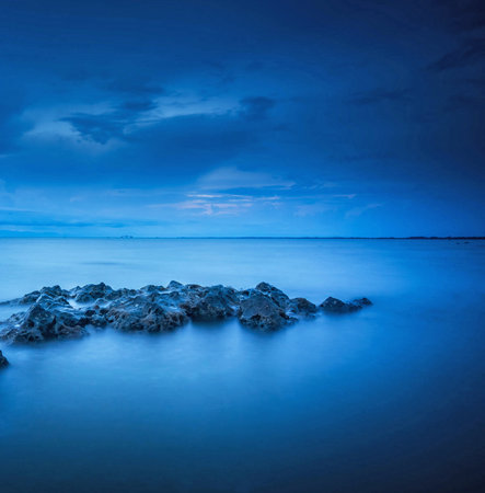 Beautiful seascape at twilight time. Long exposure photo.の写真素材
