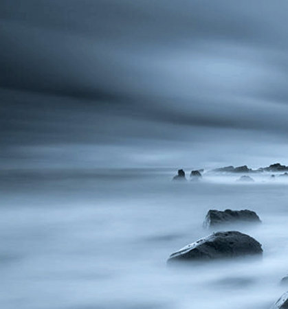 Long exposure seascape with long exposure of rocks in the sea