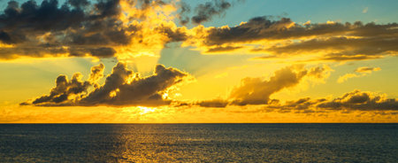 Beautiful sunset over the sea. Panoramic view of the sea.
