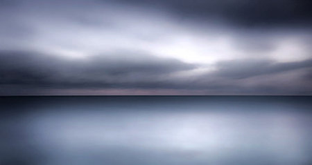 Long exposure of a stormy sky over the sea, long exposure