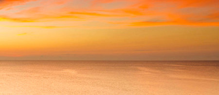 Panorama of the sea and sky at sunset. Beautiful nature backgroundの写真素材