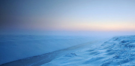 Winter landscape with snow covered road in the mountains. Panorama.の写真素材