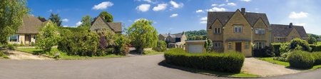 Traditional style houses, street view. Stitched panoramic image.