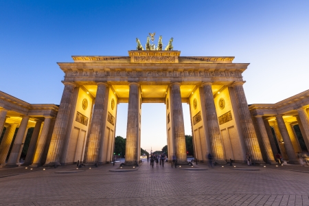 Pretty night time illuminations of the Brandenburg Gate  1788  inspired by Greek architecture, built as a symbol of peace and nationalism, now an emblem of reunification のeditorial素材