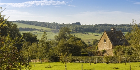 Traditional rural homes and immaculate gardens.の写真素材