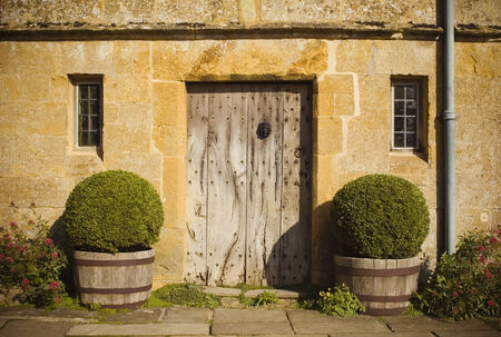 Traditional rural homes and immaculate gardens.のeditorial素材