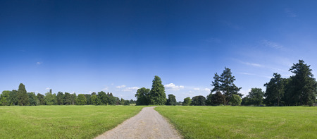 Inviting road heading to picturesque horizon.