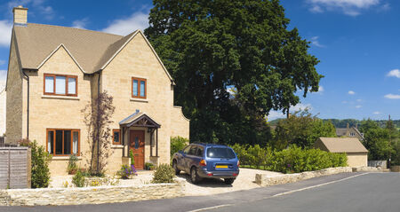 Traditional rural homes and immaculate gardens.のeditorial素材