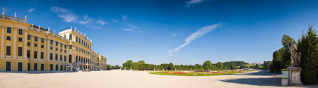 Spectacular Schloss Schonbrunn palace (1713) and immaculate gardens with clear blue sky backdrop, Vienna, Austria.のeditorial素材