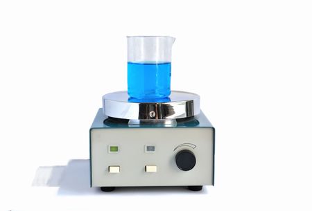 The magnetic stirrer prepare blue solution in the chemical glassの写真素材