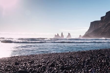 Iceland Vik coast the black beach ocean shore with mountain rock formationsの写真素材