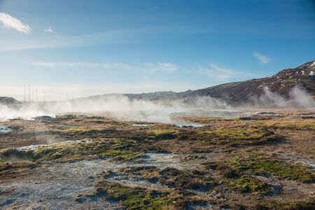 Iceland geothermal field with steam hot pots with geysersの写真素材
