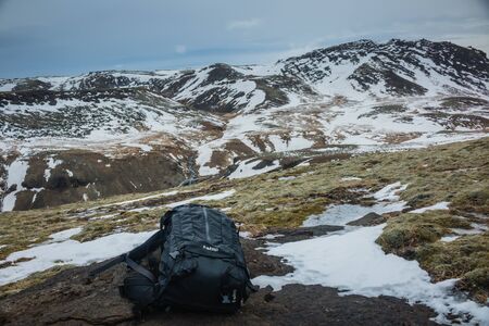 Iceland winter backpack on a snowfieldの写真素材