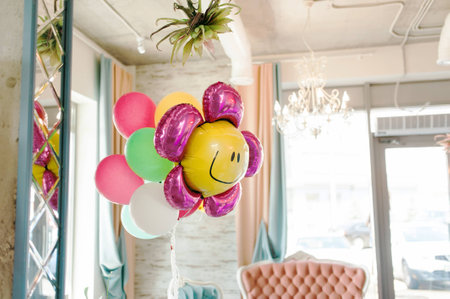 Blue balloons floating in pink pastel background room studio. minimal idea creative concept.の写真素材