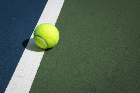 Tennis ball on the courtの写真素材