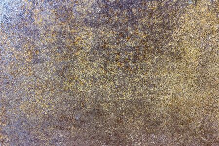 Cement surface grain texture in brown and gold.
