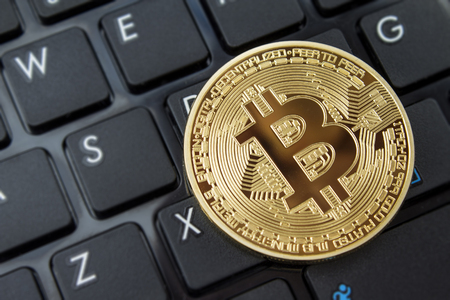Bitcoin currency blockchain mining technology and internet trading bitcoin and crypto at online exchanges.  Copy space room for wording.の写真素材