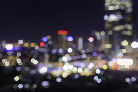 Club district with many vanues for night life.  Blurred bokeh city shot at night.  Party and lifestyle night on the town.の写真素材