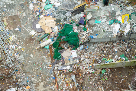 Construction site graphical resource.  Dirty grunge messy construction yard with scattered materials...