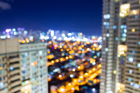 Unfocused shot with room for copyspace showing highrise buildings in a modern city with electricity lighting the highways and buildings, amid good night life and cityscape.の写真素材