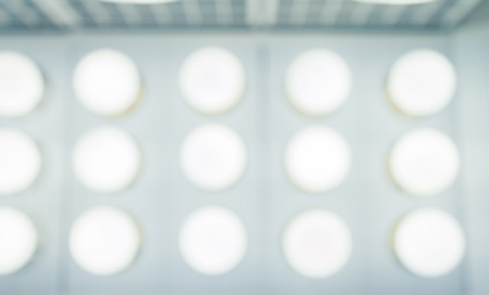 Light fixtures and bulbs in blurred shot at home department store.  Abstract hangings on wall.の写真素材