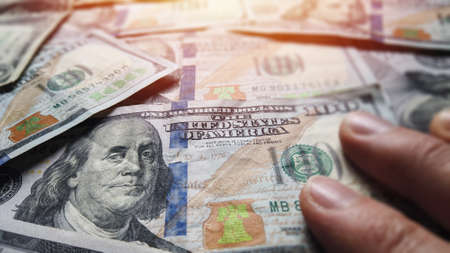 Hundred dollar bills for financial and business cash.  Benjamin franklin american currency exchange....