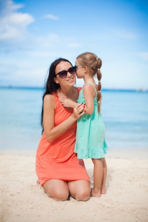 Mother and daughter at beachの写真素材
