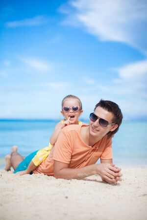 Father and daughter at beachの写真素材