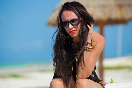 Young sexy woman on a boat on the lips red lipstickの写真素材