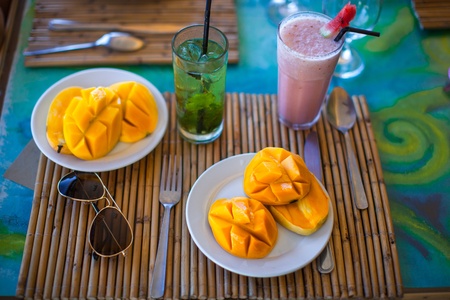 Philippino breakfast with mango and coctailsの写真素材