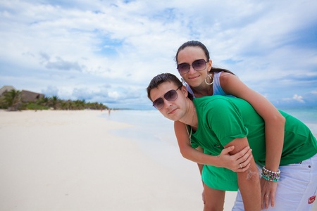Young couple having fun on a tropical beachの写真素材